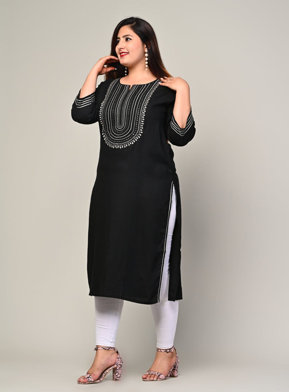 Elegant pose in black rayon kurti, breathable fabric and smooth drape for curvy and fat friendly comfort