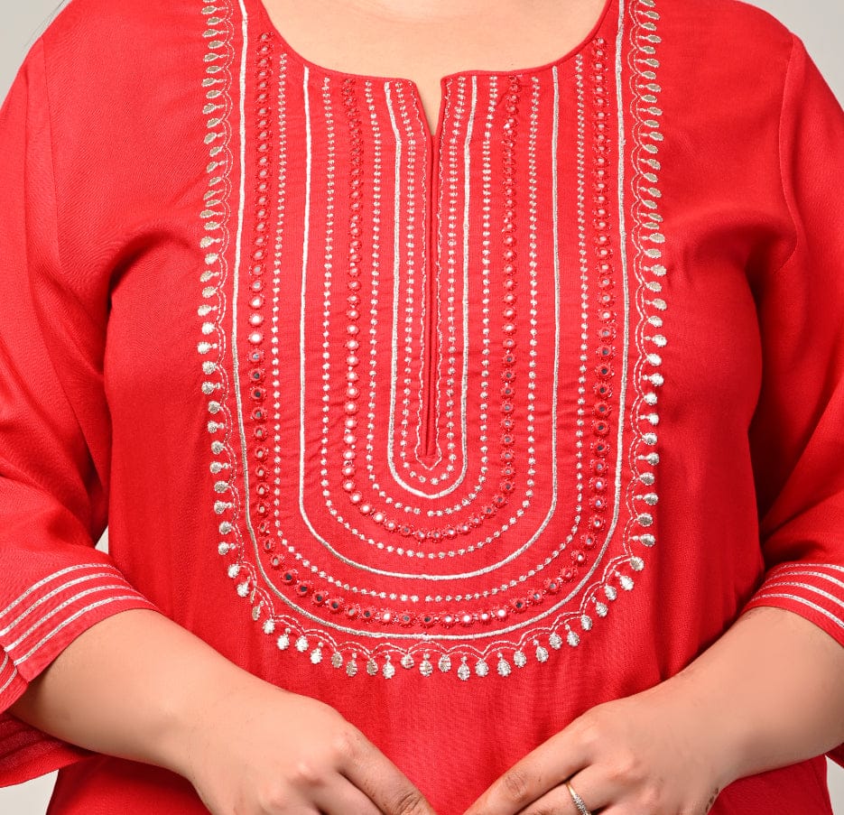 Close up of mirror work concentric yoke and notch neckline on red rayon kurti for curvy women