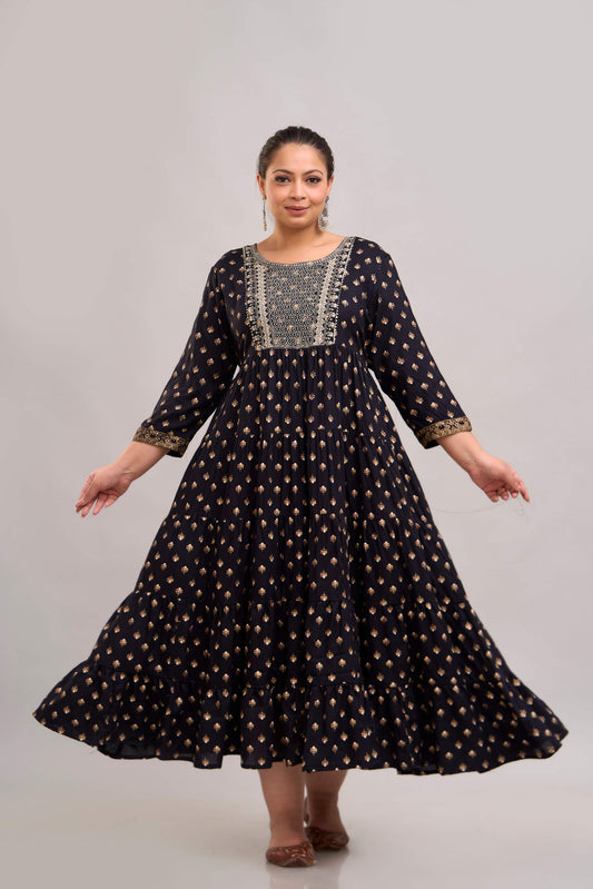 Plus size black gathered gown with embroidered yoke front angle