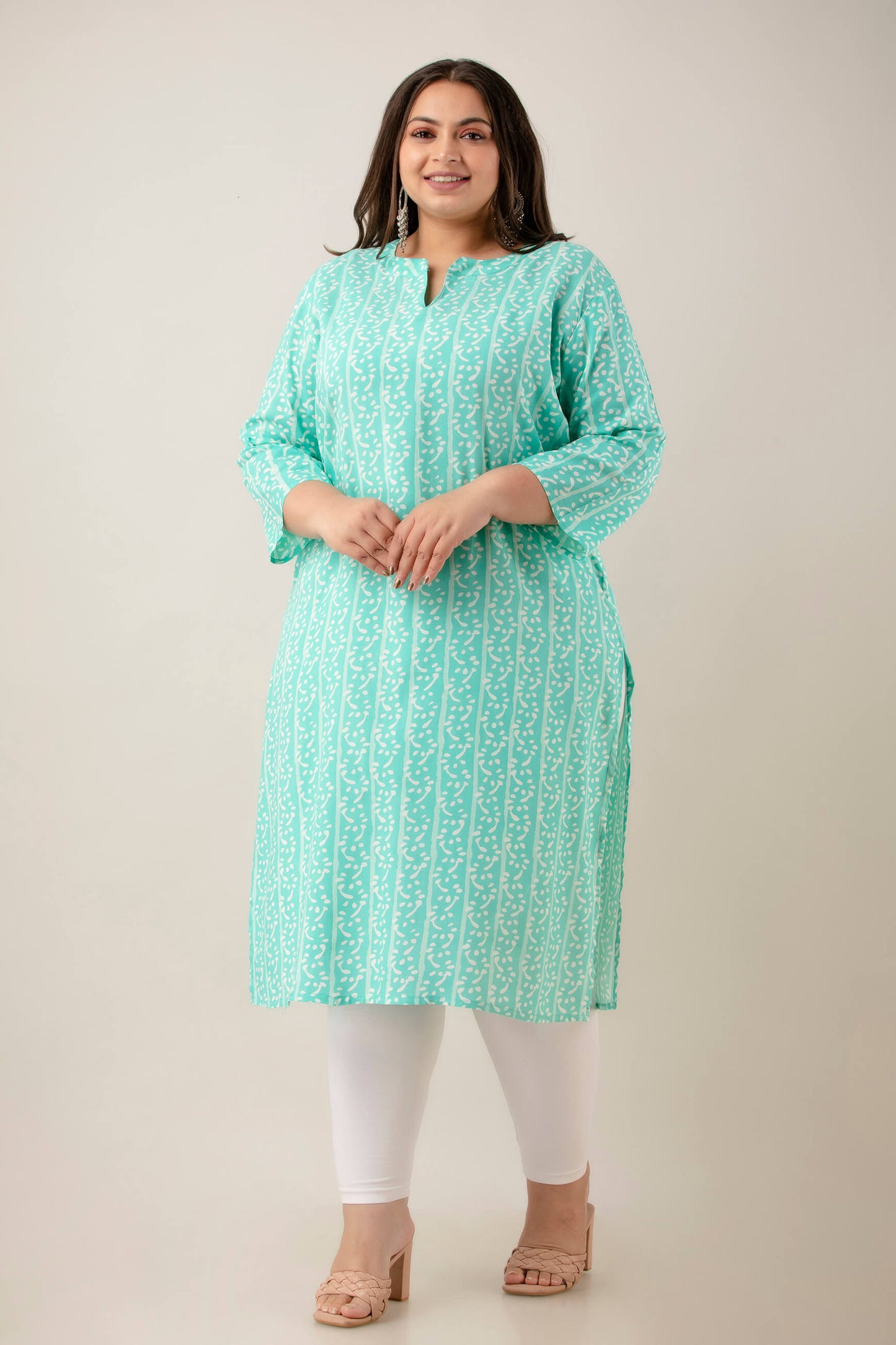 Full length kurti in mint rayon with easy straight silhouette; comfortable drape and movement; polished daily wear.