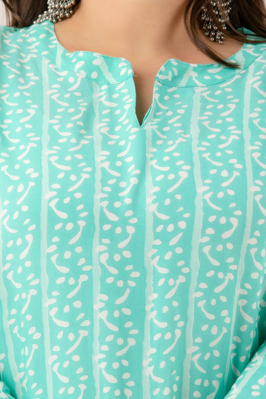 Mid closeup showing notch neck and sleeve; smooth lightweight rayon; versatile ethnic basic in mint.