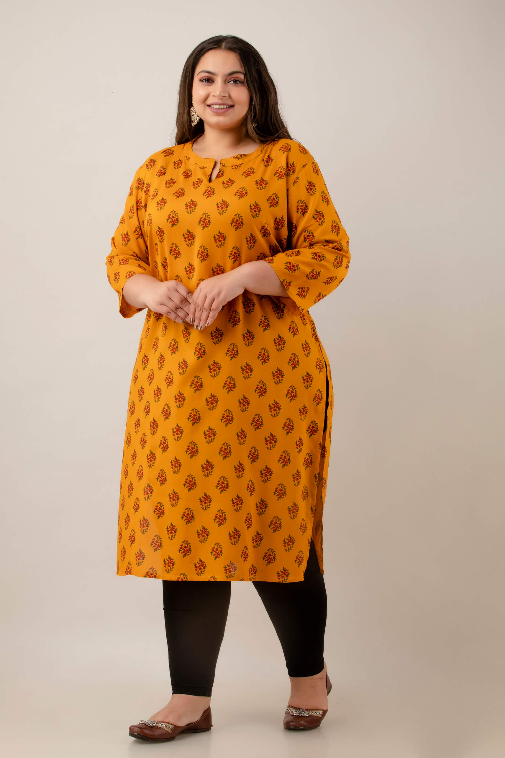 Full length kurti in mustard rayon with easy straight silhouette; comfortable drape and movement; polished daily wear.