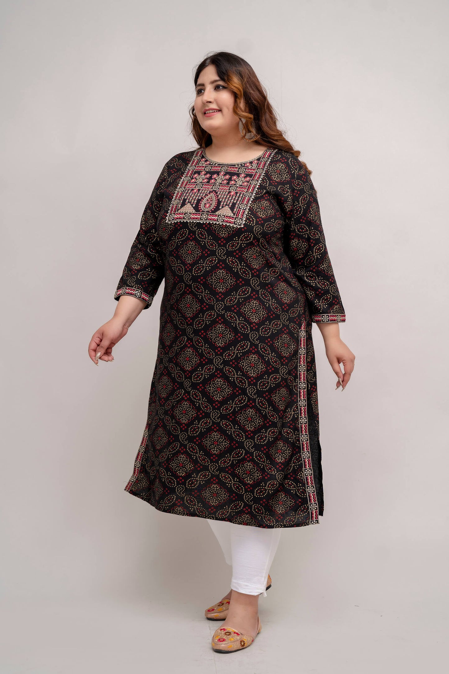 Side angle of Plus Size black rayon kurti tunic with contrast embroidered yoke and sleeve border, comfy side slits, 3XL–9XL
