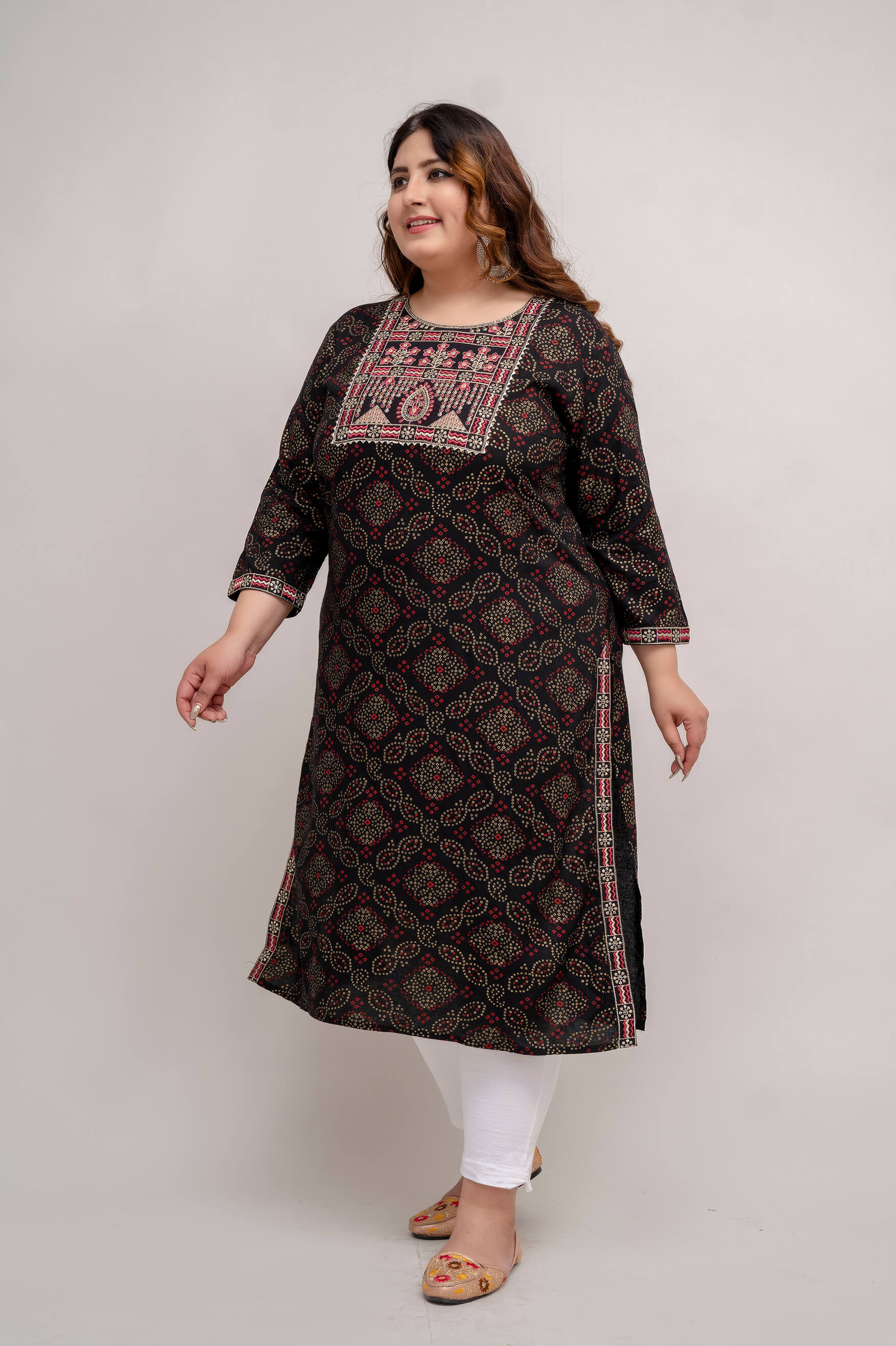 Side angle of Plus Size black rayon kurti tunic with contrast embroidered yoke and sleeve border, comfy side slits, 3XL–9XL