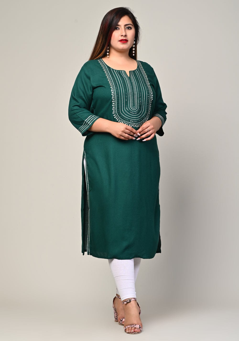 Confident front pose highlighting straight fit of green rayon kurti for curvy women and fat friendly comfort