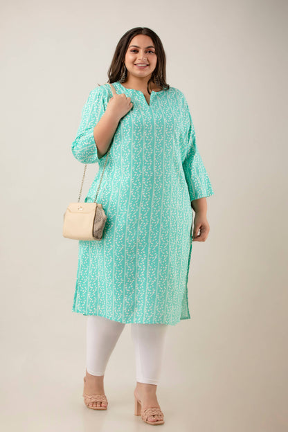 Styled look with white leggings and nude heels; mint rayon kurti with vertical stripes; confidence-boosting, fat-friendly outfit.