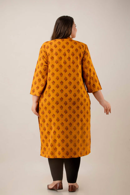 Back view of mustard rayon buta-print kurti; straight fit with side slits; breathable everyday style for plus-size and fat women.