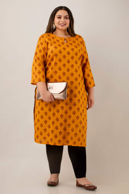 Styled look with black leggings and flats; mustard rayon kurti with all-over buta; confidence-boosting, fat-friendly outfit.