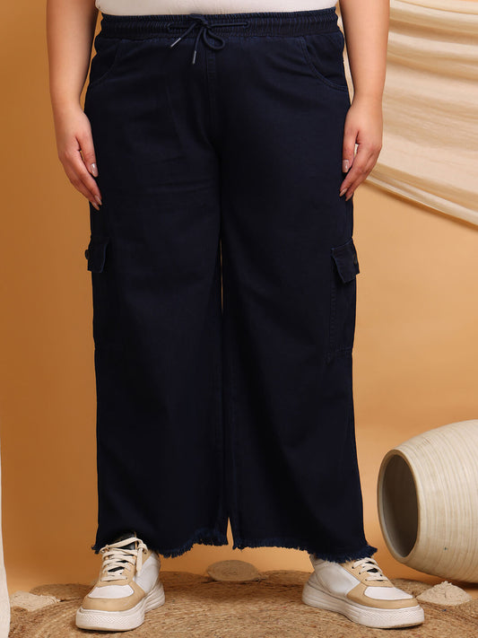 Front view of plus size navy blue denim cargo pants with wide leg and drawstring waist for curvy women – Curvisha