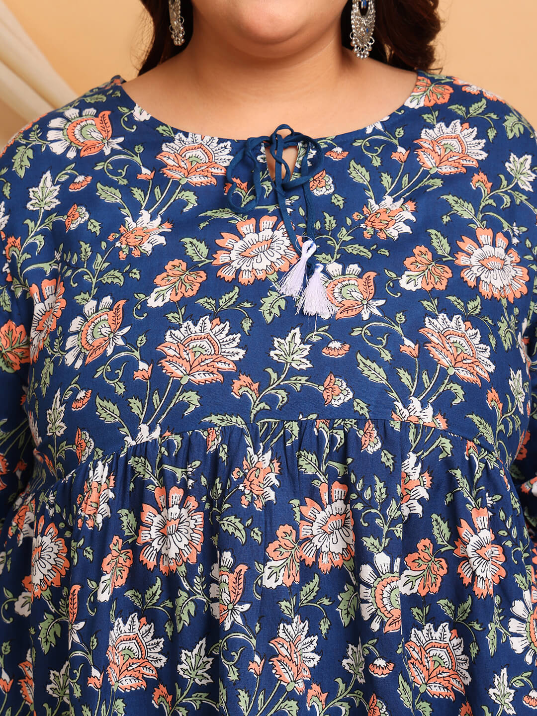 Close-Up of Floral Print and Tie-Up Neckline on Plus Size Rayon Short Kurti