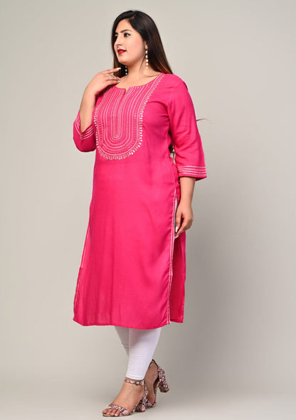Angled front showing side slit and sleeve stripe detail on pink rayon kurti, big size friendly