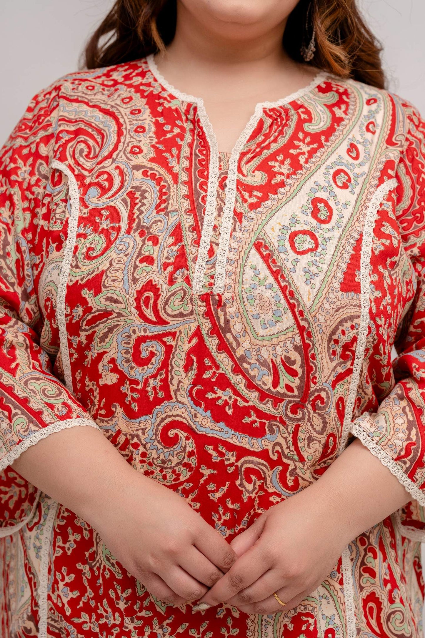 Lace trim and paisley print detail on red rayon kurti, soft drape and neat finishing, sizes 3XL–9XL