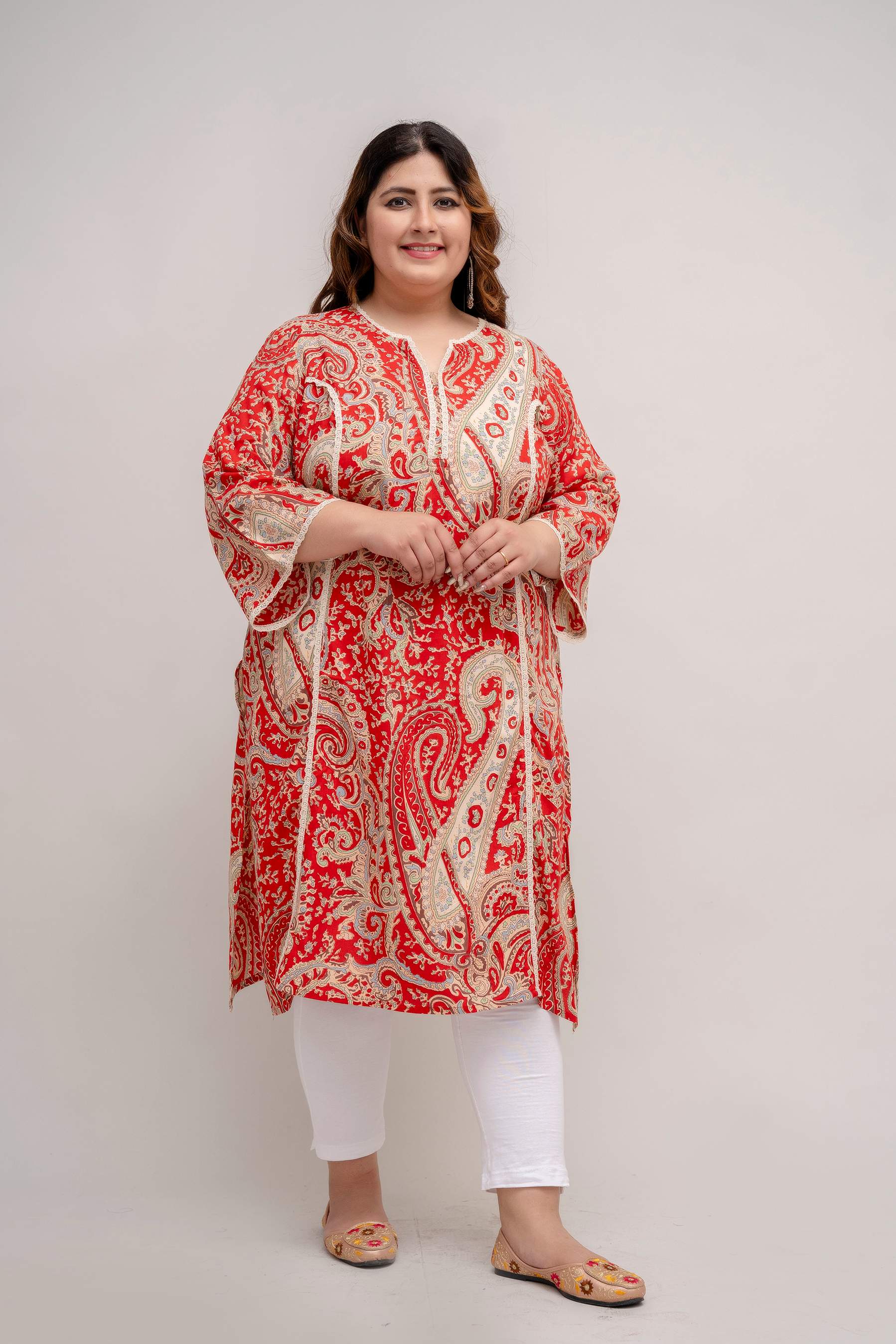 Walking shot of Plus Size red rayon kurti, festive paisley print, everyday to occasion wear for women