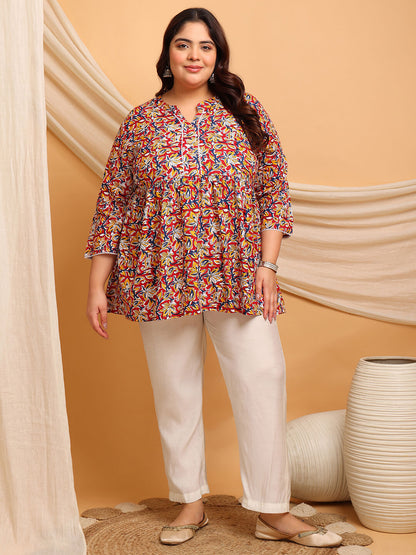 Curvy Woman Wearing Plus Size Red Floral Rayon Short Kurti with White Pants