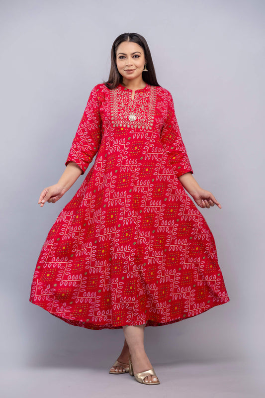 Red bandhani embroidered rayon gown twirl pose for big size women
