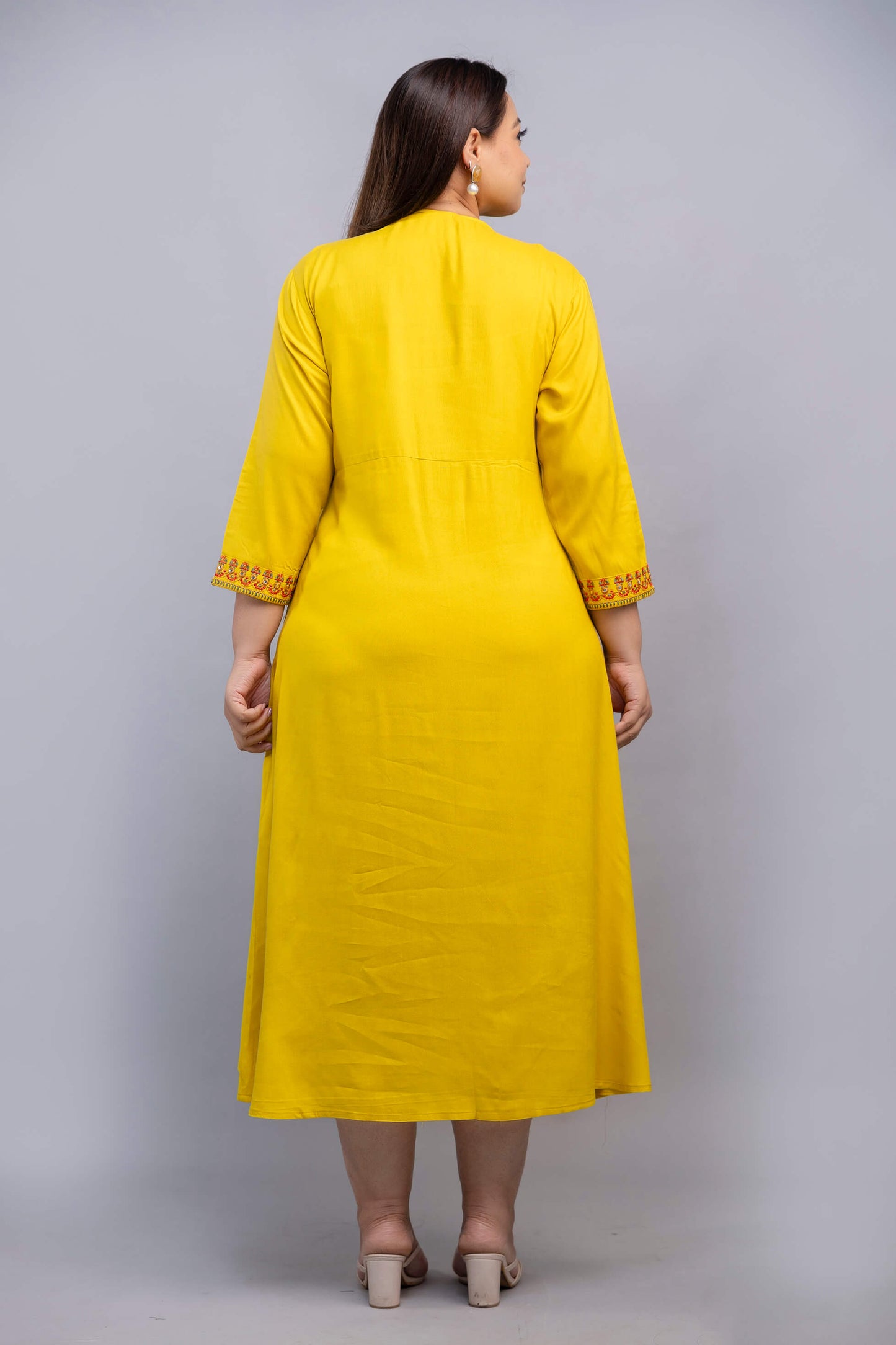 Back view of plus size yellow embroidered rayon gown for curvy women