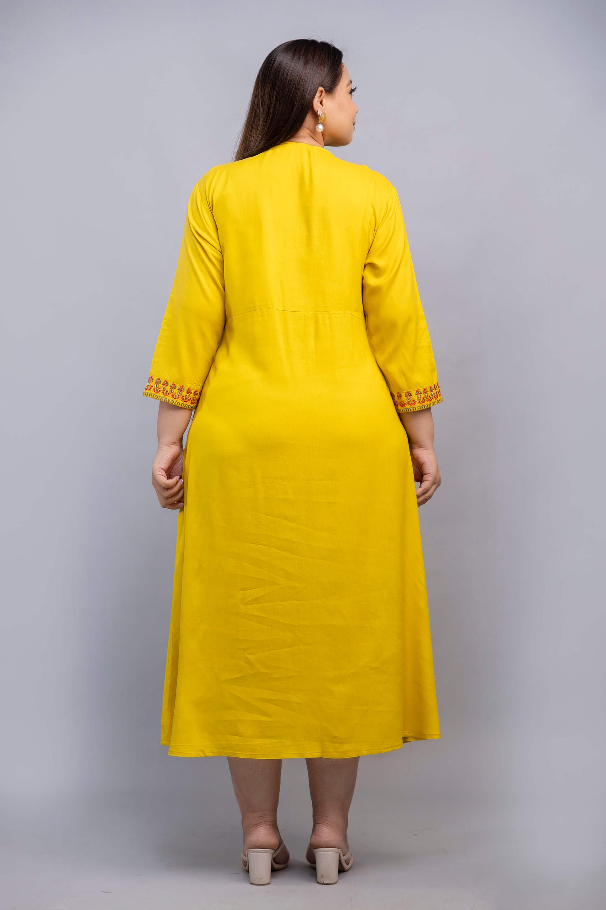 Back view of plus size yellow embroidered rayon gown for curvy women