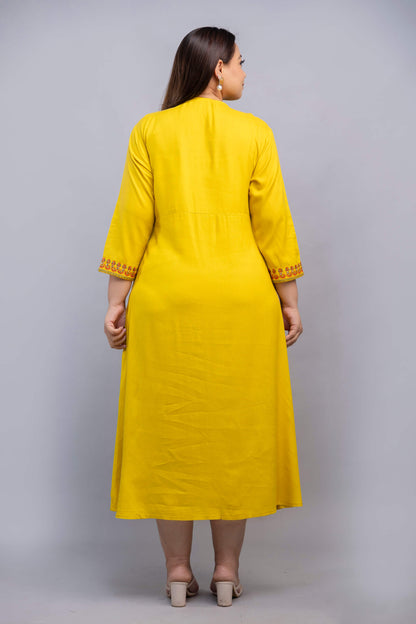 Back view of plus size yellow embroidered rayon gown for curvy women