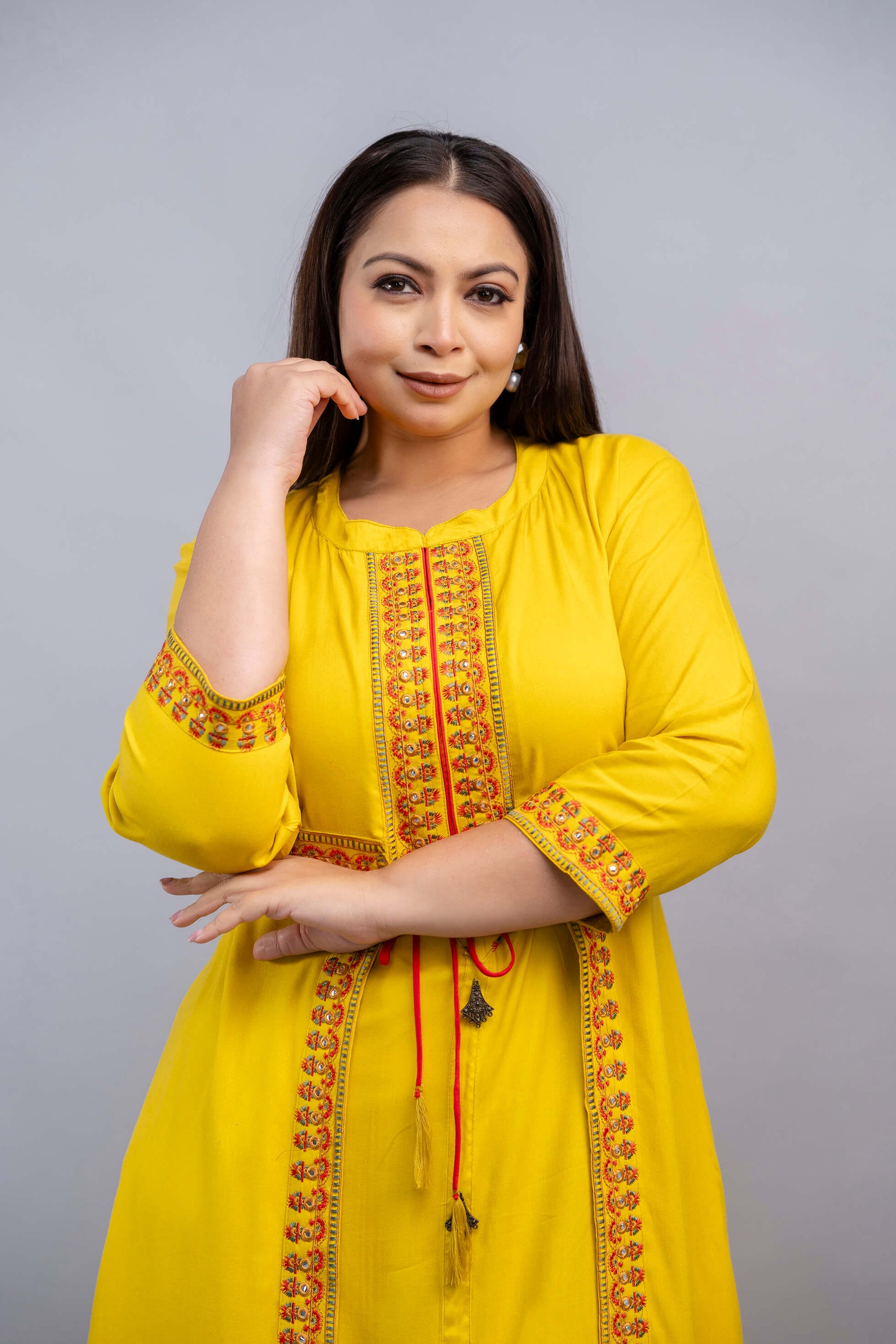 Closeup neckline embroidery on yellow rayon gown for fat plus size fashion