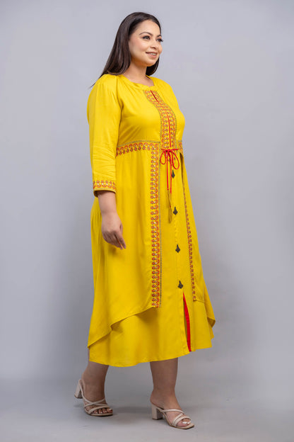 Side pose of bright yellow embroidered rayon gown for big size women