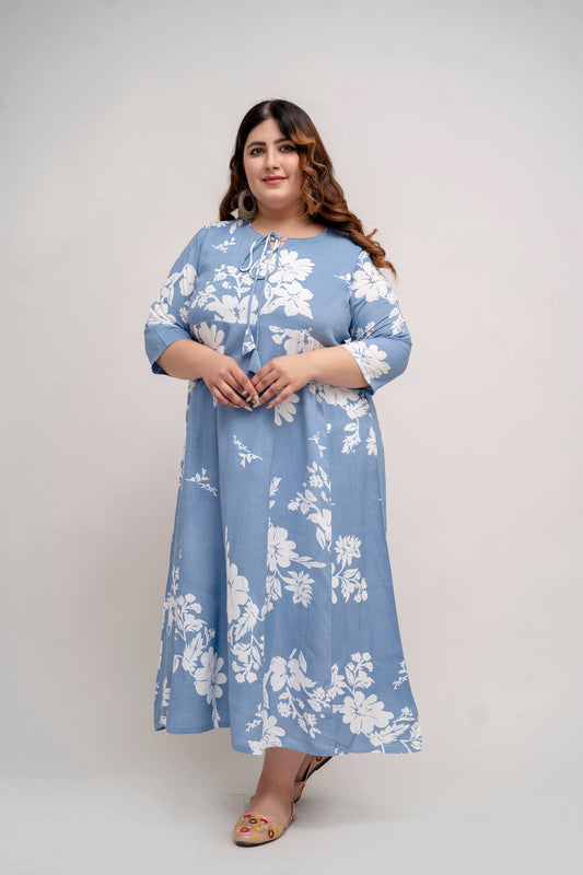 Side pose of light blue floral rayon gown dress for big size clothing