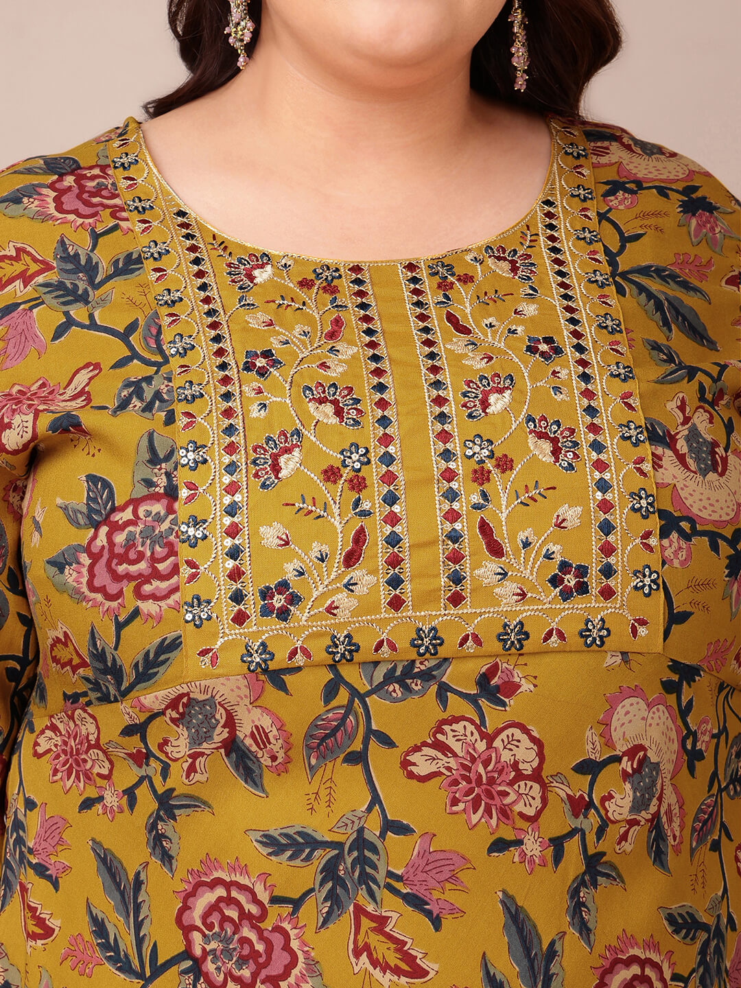Close embroidery on mustard gown for fat women who prefer stylish big size clothing