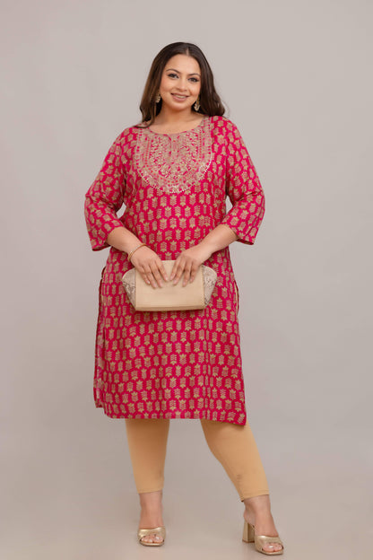 Pink rayon embroidered kurti styled with clutch; elegant big size festive kurti by Curvisha