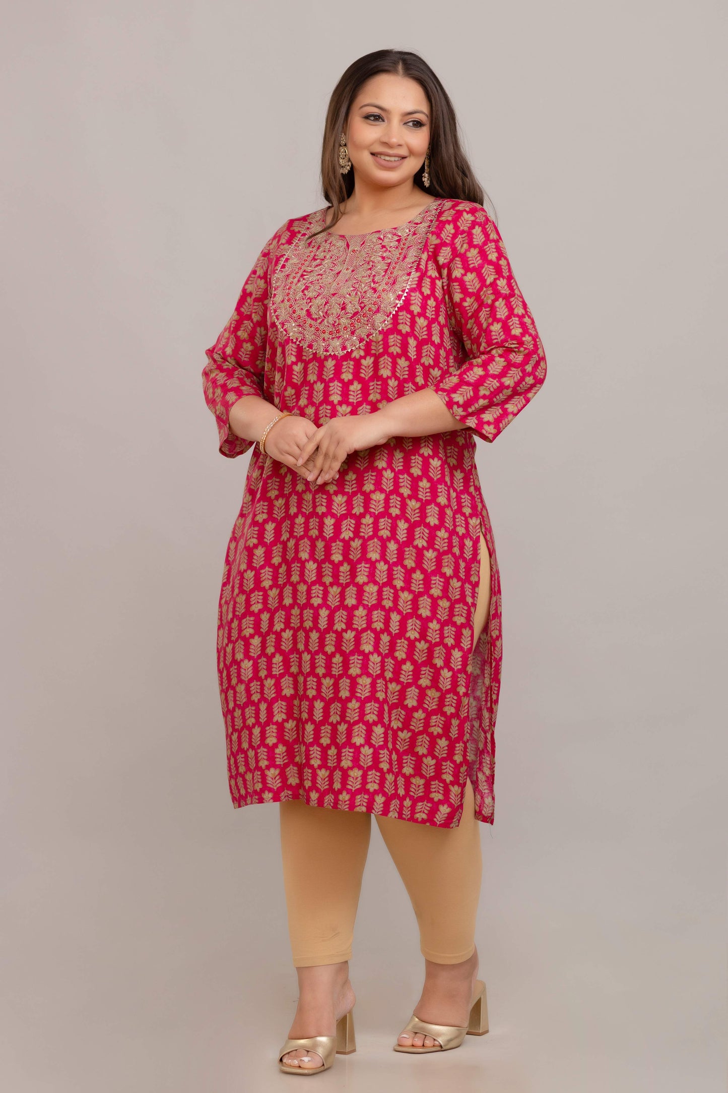 Side view showing side slit and relaxed fit; pink rayon big size kurti for curvy/fat women