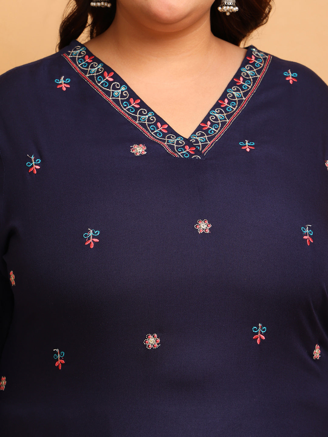 Close up of V neck embroidery on plus size navy rayon kurti detailed thread work kurti for women