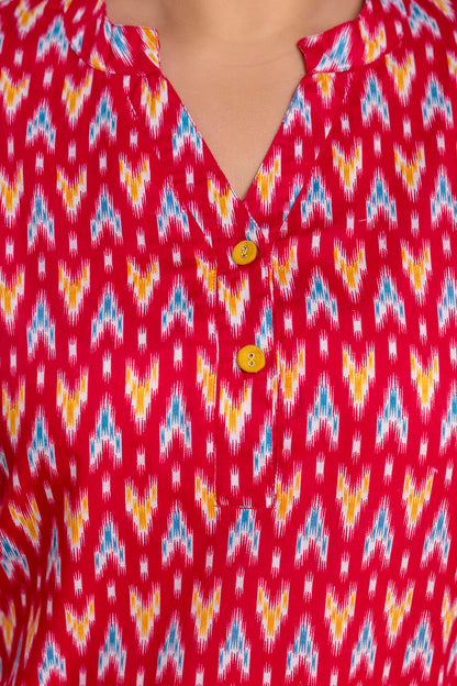 Close up button detail of plus size red ikat cotton short kurti