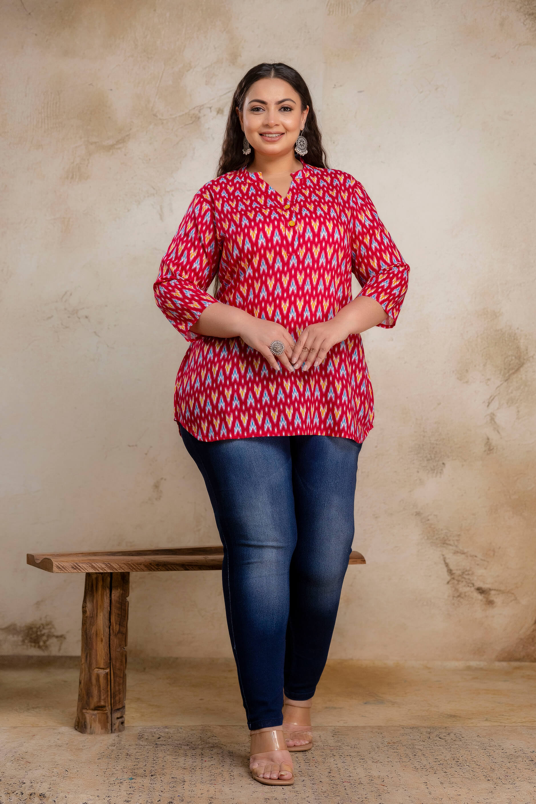 Full length plus size red ikat cotton short kurti styled with jeans