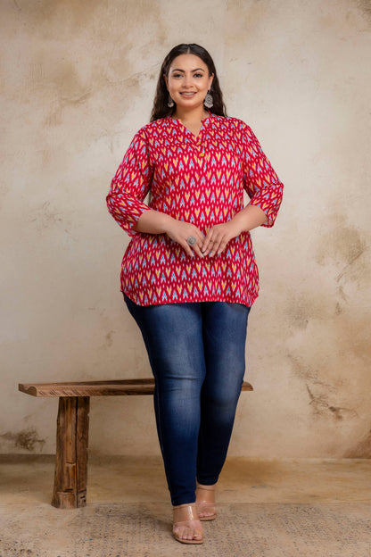 Full length plus size red ikat cotton short kurti styled with jeans