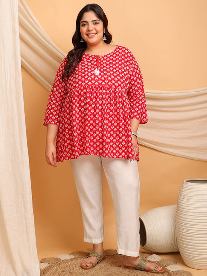 Full outfit: plus size red printed rayon short kurti tunic styled with white pants for everyday wear – Curvisha
