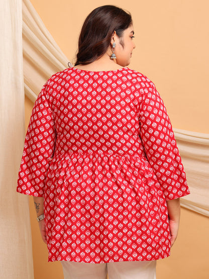 Back view of plus size red printed rayon short kurti tunic with empire yoke gathers and relaxed ¾ sleeves – Curvisha