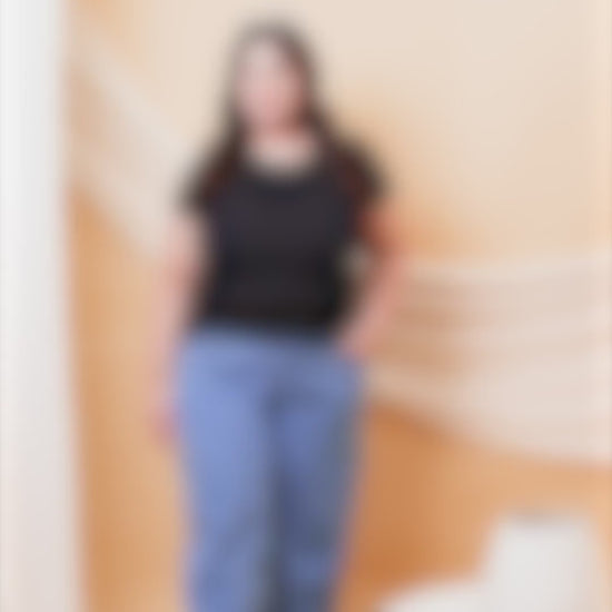 Close-up video of Curvisha utility cargo pants showing functional pockets and premium fabric quality in motion.