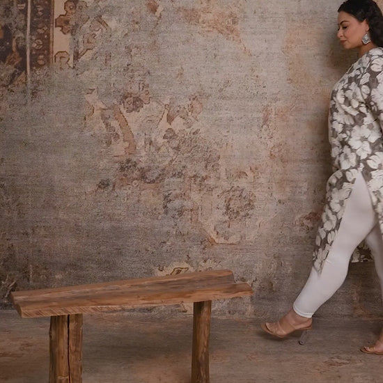 Model walking in Curvisha plus size olive green floral kurta, showing the breathable fabric and comfortable movement for curvy women.