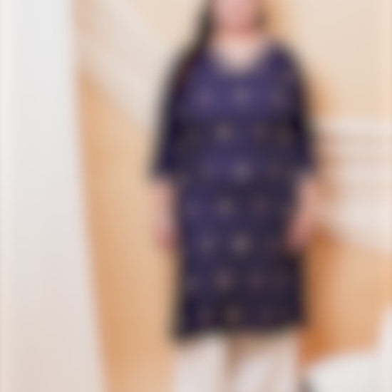 Classic navy blue plus size kurti for women with colorful star embroidery and embroidered cuffs.