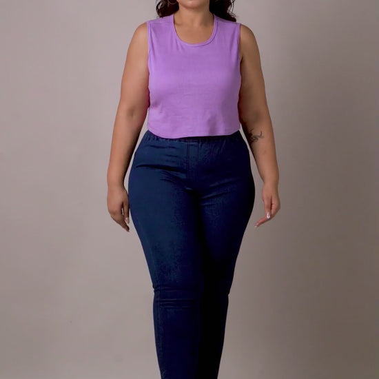 Detailed view of Curvisha denim jeggings with tummy control features in a sleek blue finish.