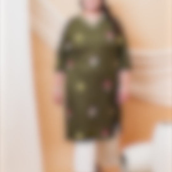 Sophisticated olive green plus size kurti with small floral embroidery and a striped V-neck border.