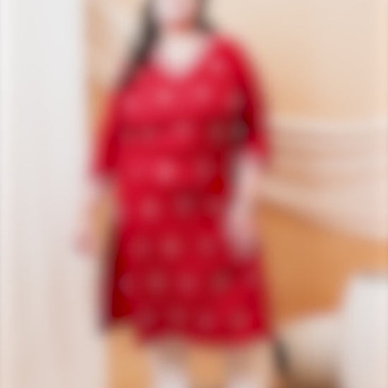 Elegant plus size maroon kurti with intricate V-neck embroidery for festive occasions.