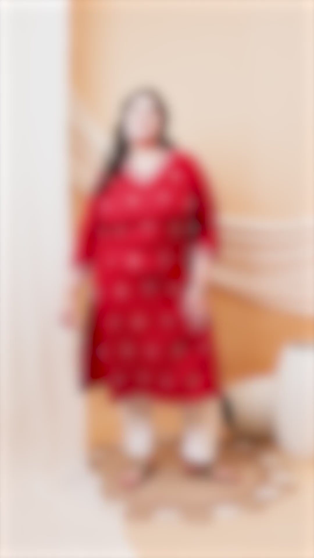 Elegant plus size maroon kurti with intricate V-neck embroidery for festive occasions.