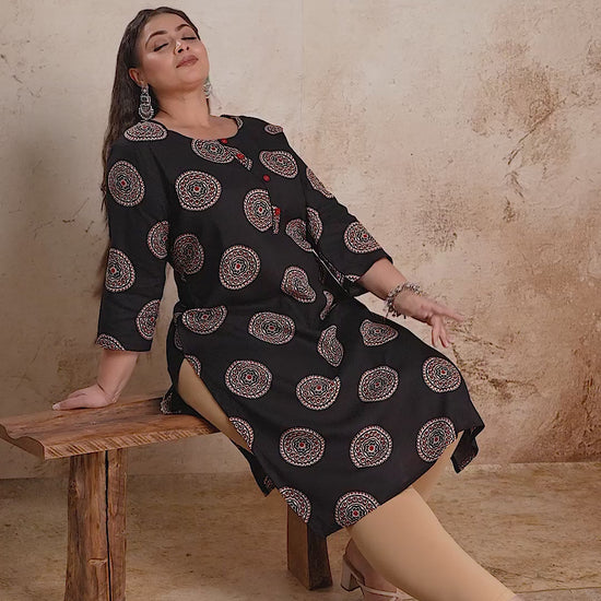 Black plus size ethnic kurta featuring a white mandala circular print and straight-cut design by Curvisha.