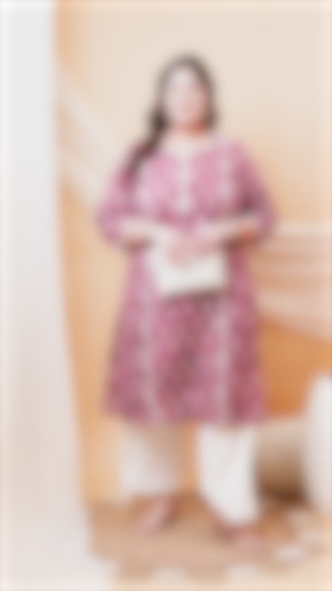 Women's plus size berry pink kurti featuring white floral motifs and delicate lace accents.