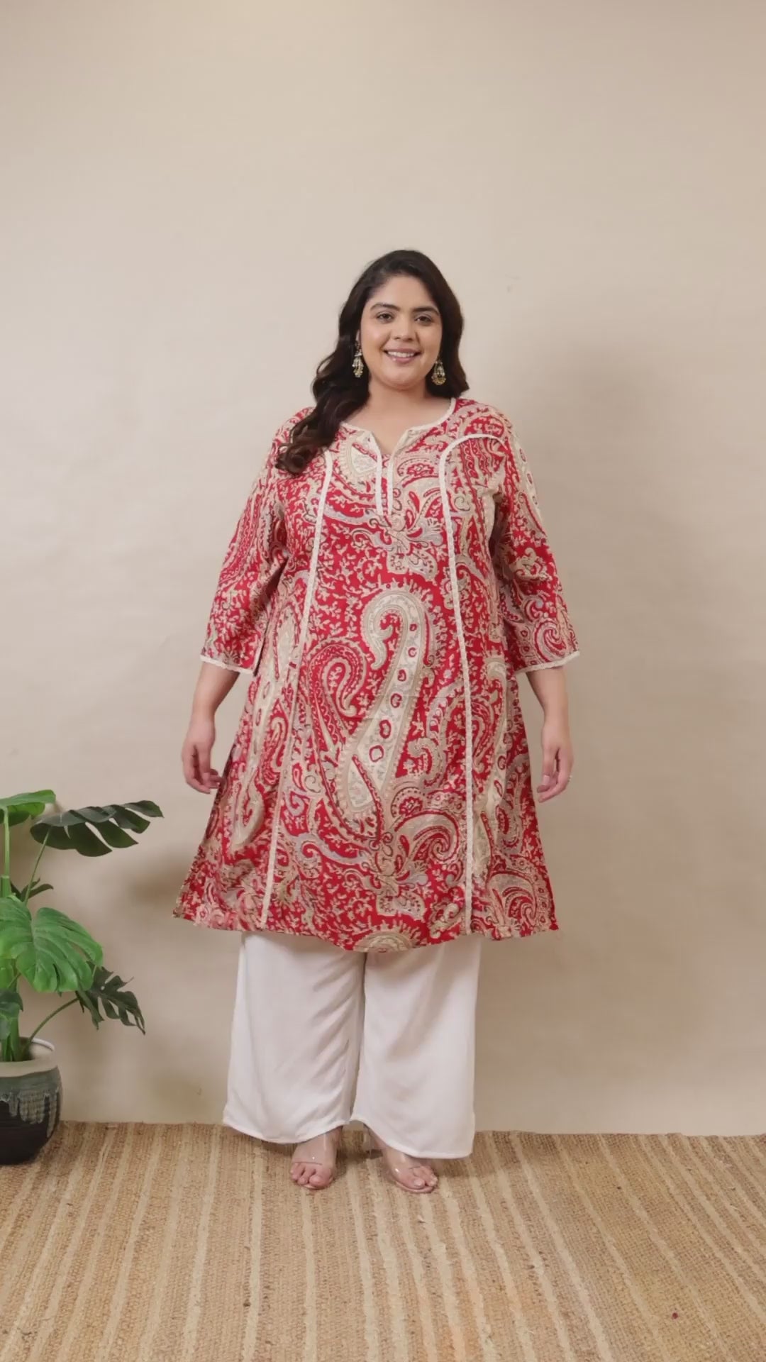 Vibrant red paisley plus size kurta set by Curvisha with white embroidery and matching palazzo pants.