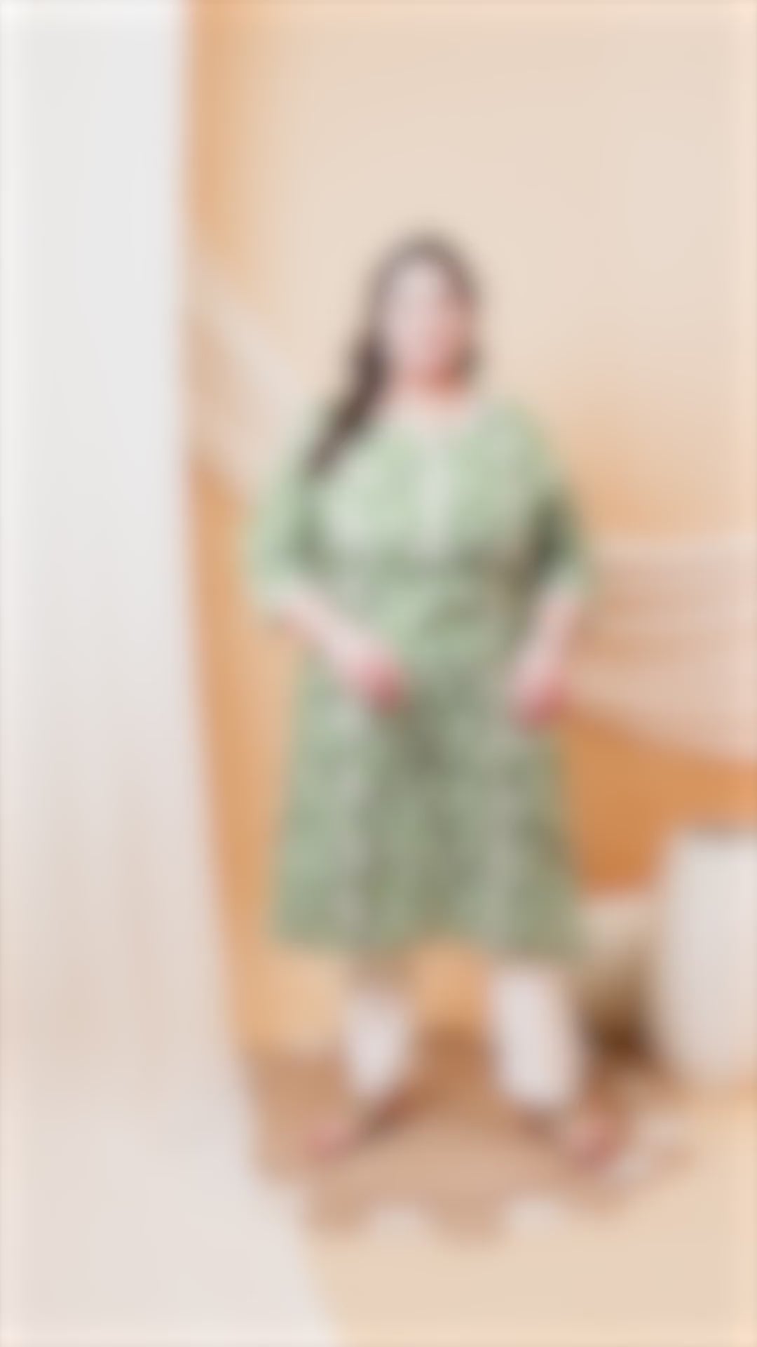 Plus size sage green kurti with white geometric print and lace detailing, ideal for daily ethnic wear.
