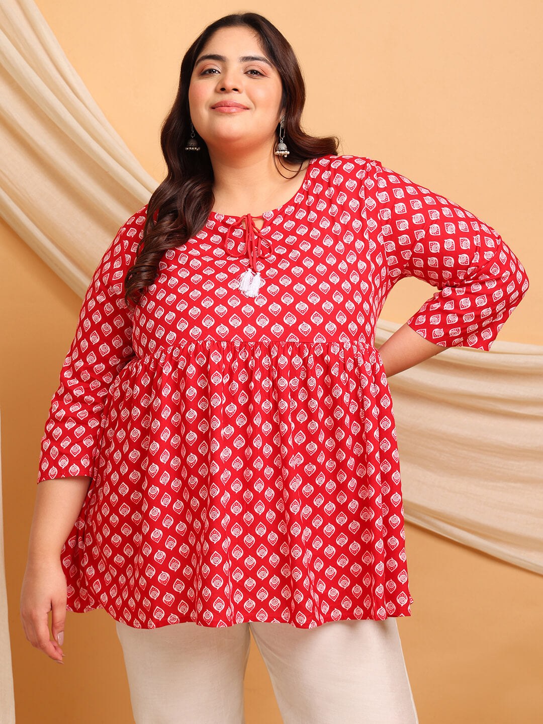 Side view showing A-line flow and ¾ sleeve comfort of red rayon plus size kurti tunic – Curvisha