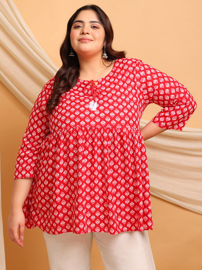 Side view showing A-line flow and ¾ sleeve comfort of red rayon plus size kurti tunic – Curvisha