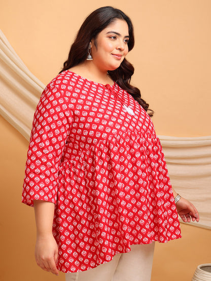 Detailed view of empire yoke and soft gathers on red printed rayon plus size short kurti tunic – Curvisha