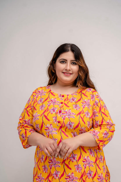 Portrait in yellow floral cotton kurti; flattering plus size look, breathable big size clothing